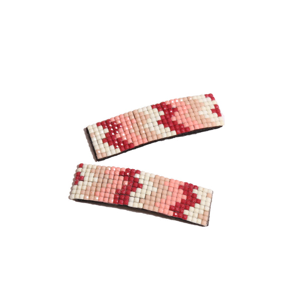 set of pink hair clips with geometric zig zag beading