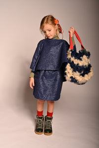 kids blue and white faux fur tote bag with red strap