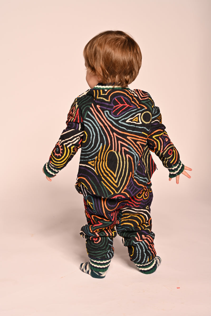baby boy wearing padded sweatshirt in fine cotton corduroy with all over print by TiA CiBANi