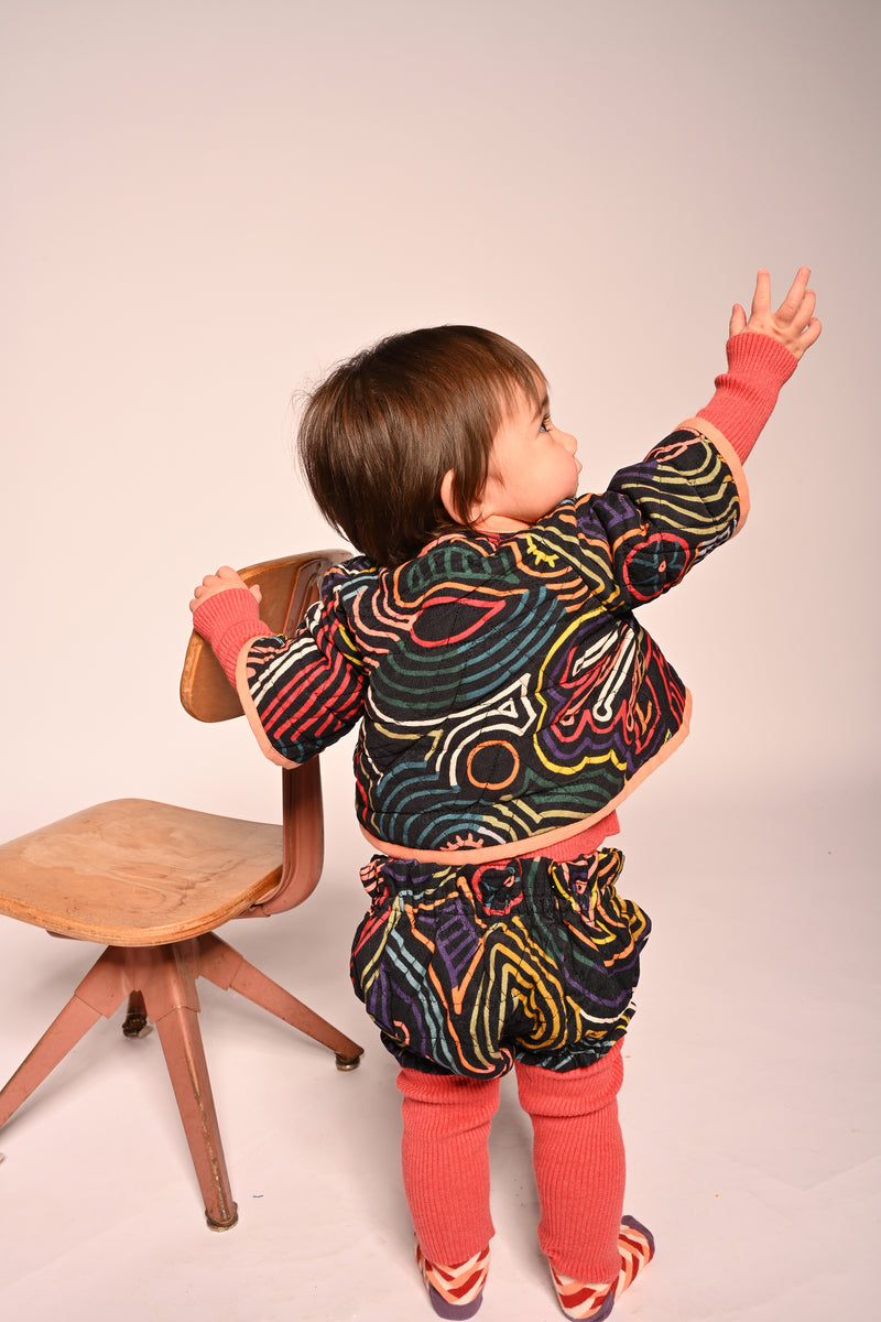baby wearing cotton corduroy padded cross wrap shirt with all over print