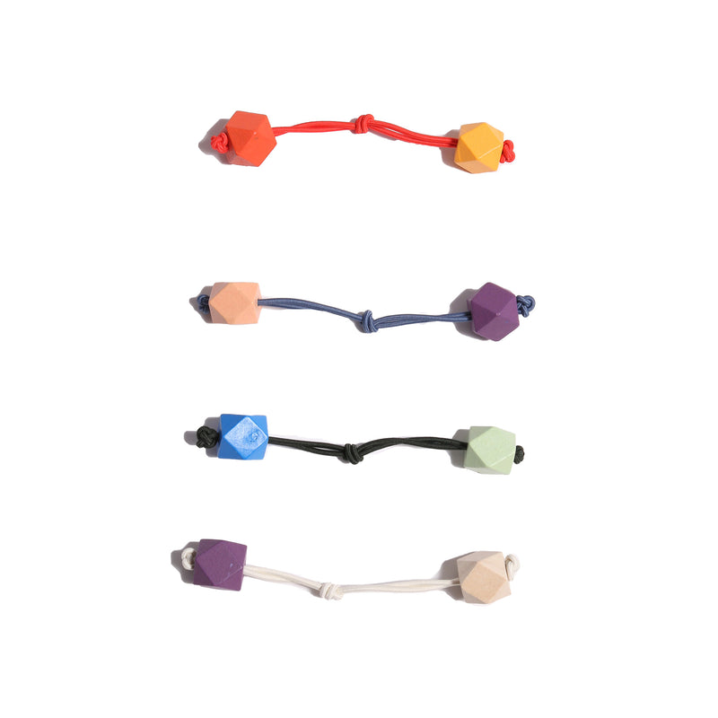 set of 4 multicolored hair tie elastics with wooden beads on the end