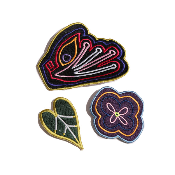 set of three embroidered brooches