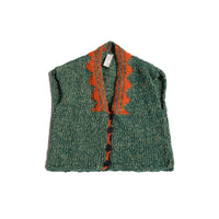 girls green hand knit wool vest with orange patterned neckline