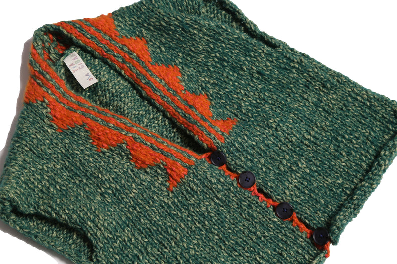 girls green hand knit wool vest with orange patterned neckline