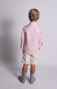 boy wearing pink button down shirt, back