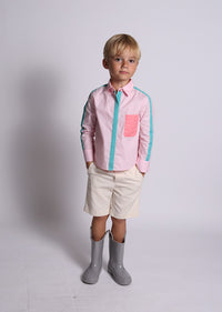 boy wearing pink button down shirt, blue detail