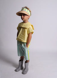 boys, Bermudas, shorts, seersucker, yellow detail, green, white, stripe, elastic waist, model photo  Edit alt text