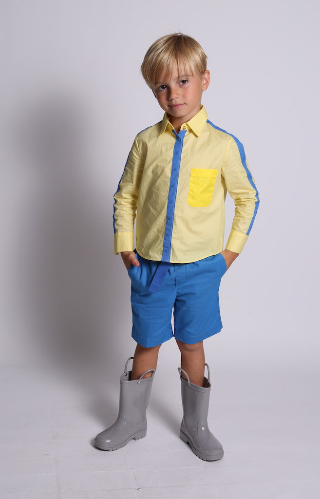 boy wearing yellow button down shirt, snap buttons, blue detailing, front 
